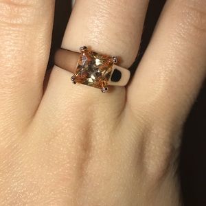 Beautiful silver and orange ring that is a size 8